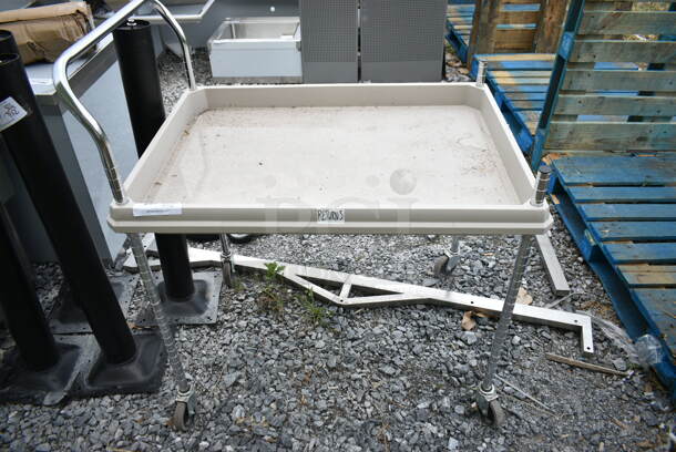 Tan Poly and Metal Cart on Commercial Casters.  - Image 1 of 3