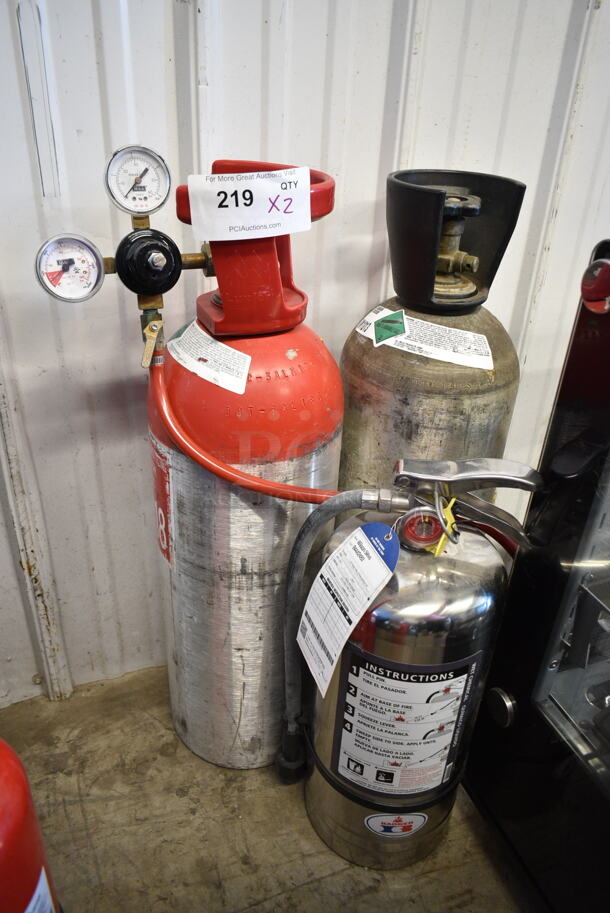 3 Items; 2 Metal Carbon Dioxide Tanks and 1 Wet Chemical Fire Extinguisher. 3 Times Your Bid! Buyer Must Pick Up - We Will Not Ship This Item.
 - Image 1 of 11
