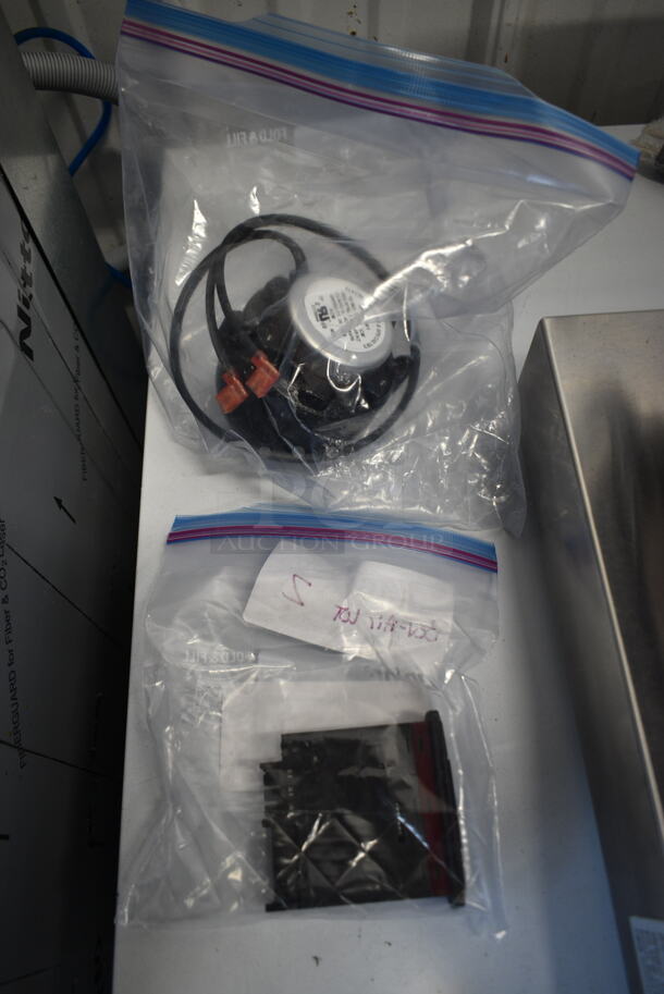 BRAND NEW SCRATCH AND DENT! Lot of Items Including 185502504D02 Beverage-Air 502-504D-02 Controller and 185501158B01 Beverage-Air 501-158B-01 Condenser Fan Motor - 115V, 16W - Image 1 of 4