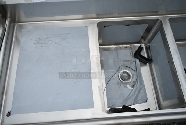 BRAND NEW SCRATCH AND DENT! Regency 600S31824224 Stainless Steel Commercial 3 Bay Sink w/ Dual Drain Boards. No Legs. Bays 18x23x14. Drain Boards 22.5x25.5 - Image 5 of 6