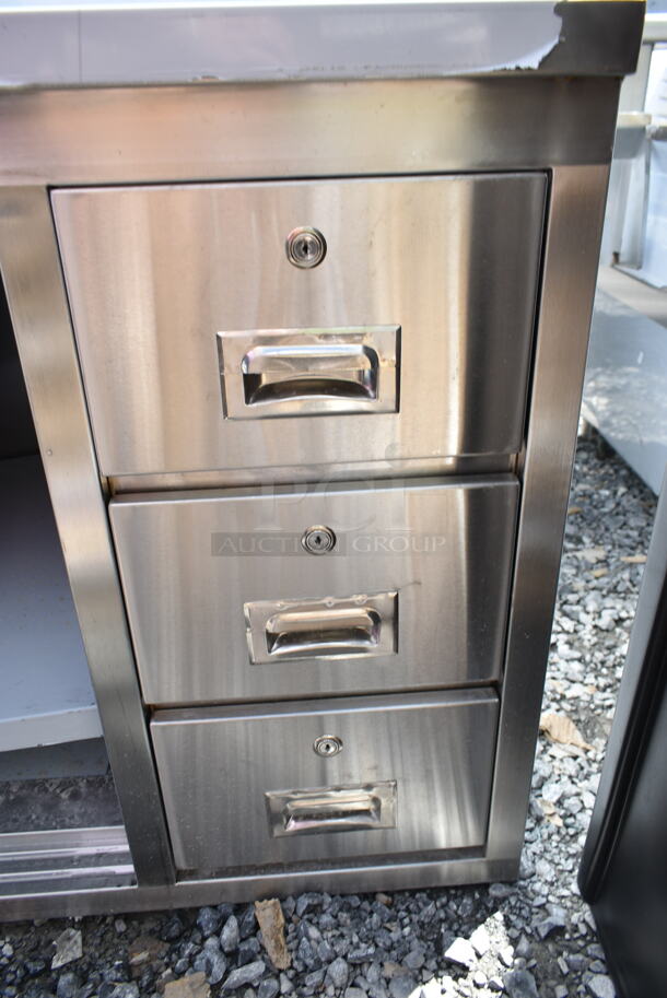 BRAND NEW SCRATCH AND DENT! Regency 600EBTB3060R 30" x 60" 16 Gauge Type 304 Stainless Steel Enclosed Base Sliding Door Table with Drawers and 6" Backsplash - Image 5 of 6