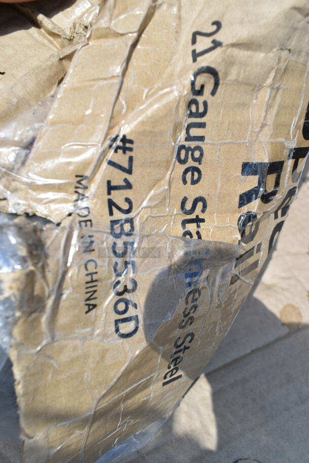 2 BRAND NEW SCRATCH AND DENT! Items; 712B5536D Steelton Stainless Steel Double Tier Speed Rail - 36", Regency 600FT1242SS 12" x 42" 14-Gauge Stainless Steel Floor Trough with Grate. 2 Times Your Bid! May Be Missing Pieces.  - Image 2 of 3