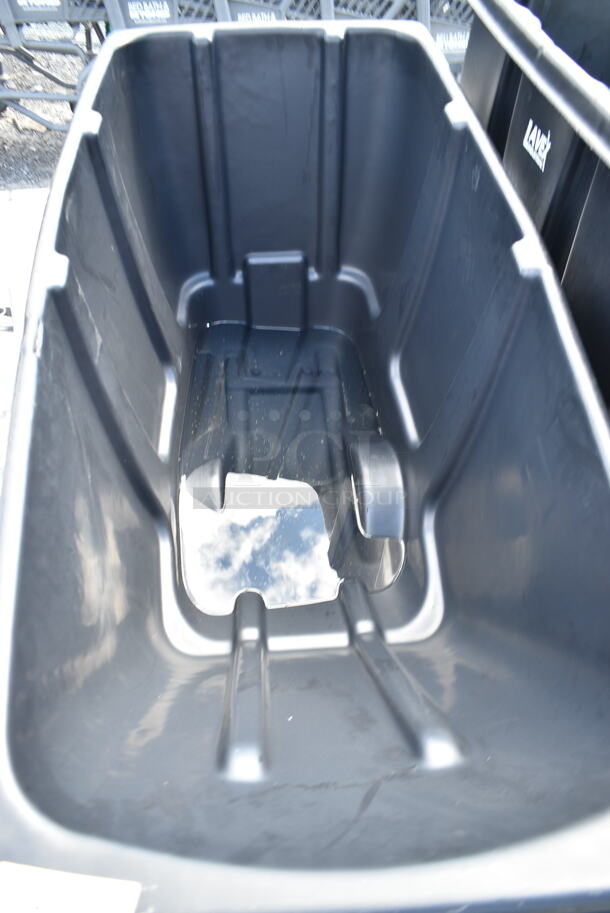 BRAND NEW SCRATCH AND DENT! Lavex 475AG0011BBK Black 0.5 Cubic Yard Black Standard-Duty Tilt Truck / Trash Cart (300 lb. Capacity) - Image 4 of 5