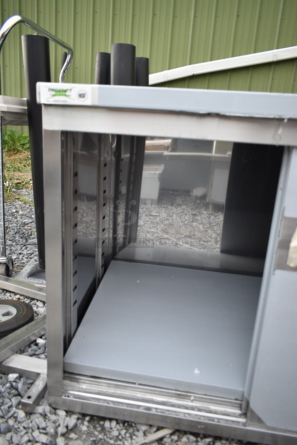 BRAND NEW SCRATCH AND DENT! Regency 600EBT2460R 24" x 60" 16 Gauge Type 304 Stainless Steel Enclosed Base Sliding Door Table with Drawers - Image 4 of 6