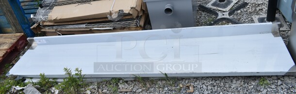 BRAND NEW SCRATCH AND DENT! Regency 600TB1896G 18" x 96" 18-Gauge 304 Stainless Steel Commercial Work Table with 4" Backsplash and Galvanized Undershelf. No Legs. - Image 2 of 5