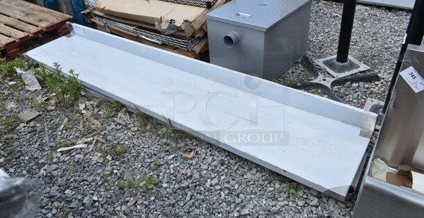 BRAND NEW SCRATCH AND DENT! Regency 600TB1896G 18" x 96" 18-Gauge 304 Stainless Steel Commercial Work Table with 4" Backsplash and Galvanized Undershelf. No Legs. - Image 3 of 5