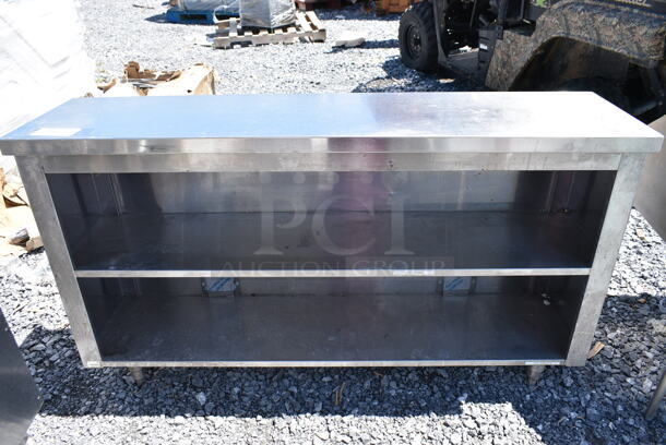 Stainless Steel Counter w/ 2 Under Shelves.   - Image 1 of 3