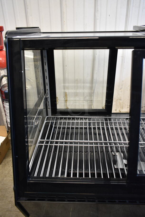 BRAND NEW SCRATCH AND DENT! Avantco 360BCSS28HCB Metal Commercial Countertop 27 5/8" Black Self-Serve Refrigerated Countertop Bakery Display Case with LED Lighting. 115 Volts, 1 Phase. Tested and Working! - Image 7 of 8