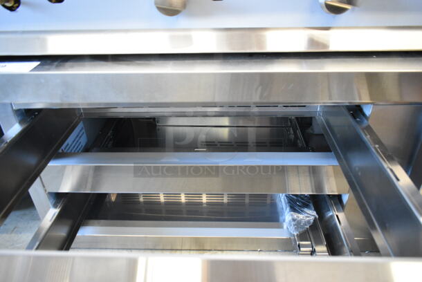 BRAND NEW SCRATCH AND DENT! Avantco 178CBE72HC Stainless Steel Commercial 4 Drawer Chef Base. No Casters. 115 Volts, 1 Phase. Tested and Working! - Image 7 of 7