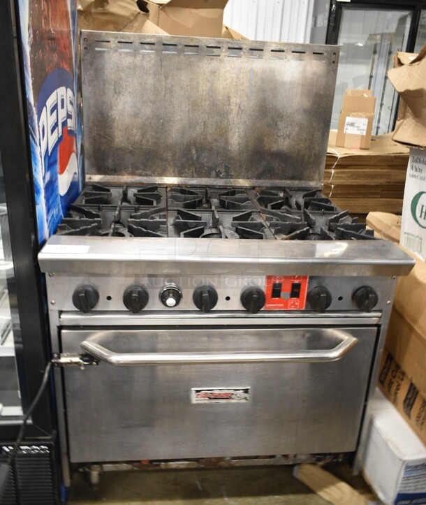 Tri Star Stainless Steel Commercial Natural Gas Powered 6 Burner Range w/ Convection Oven and Back Splash.  - Image 1 of 4