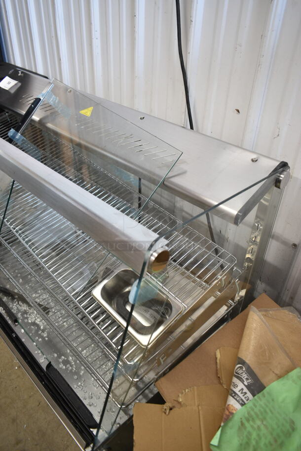BRAND NEW SCRATCH AND DENT! ServIt 423HDM48SA Stainless Steel Commercial 48" Self / Full Service 3 Shelf Countertop Heated Display Case with Sliding Doors. See Pictures for Damage. 115 Volts, 1 Phase. Tested and Working! - Image 3 of 7