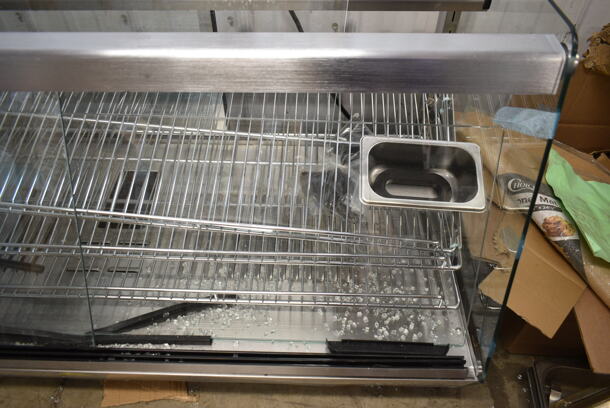 BRAND NEW SCRATCH AND DENT! ServIt 423HDM48SA Stainless Steel Commercial 48" Self / Full Service 3 Shelf Countertop Heated Display Case with Sliding Doors. See Pictures for Damage. 115 Volts, 1 Phase. Tested and Working! - Image 4 of 7