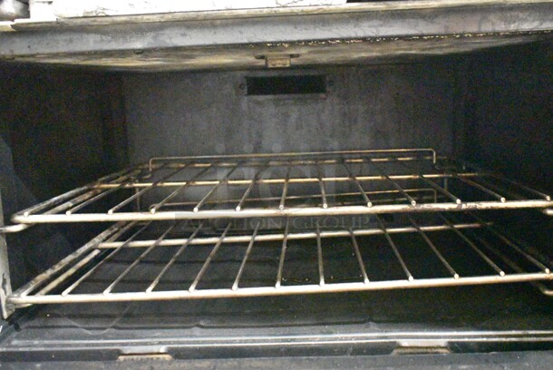 Garland X60-10RR SunFire Stainless Steel Commercial Natural Gas Powered 10 Burner Range w/ 2 Ovens, Over Shelf and Back Splash on Commercial Casters.  - Image 4 of 8