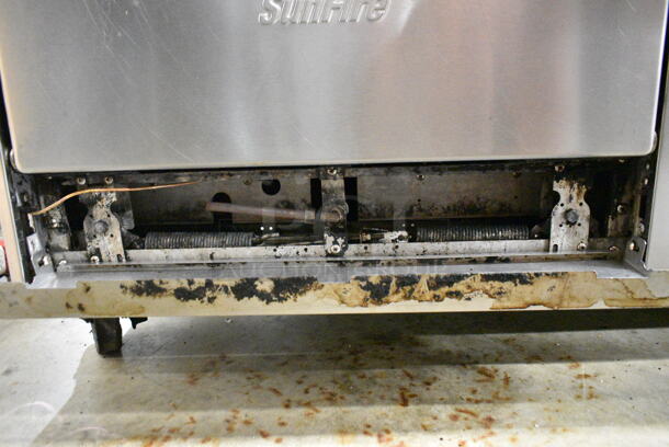 Garland X60-10RR SunFire Stainless Steel Commercial Natural Gas Powered 10 Burner Range w/ 2 Ovens, Over Shelf and Back Splash on Commercial Casters.  - Image 6 of 8