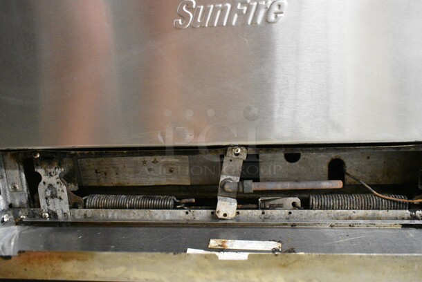Garland X60-10RR SunFire Stainless Steel Commercial Natural Gas Powered 10 Burner Range w/ 2 Ovens, Over Shelf and Back Splash on Commercial Casters.  - Image 7 of 8