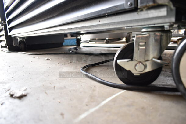 LIKE NEW! Avantco 178GDS47HCB Metal Commercial 2 Door Reach In Cooler Merchandiser w/ Poly Coated Racks on Commercial Casters. 115 Volts, 1 Phase. Tested and Working! - Image 3 of 7