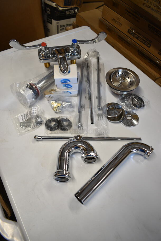 ALL ONE MONEY! Lot of BRAND NEW Items Including Stainless Steel Faucet, Pipe Pieces and Drains - Image 1 of 11