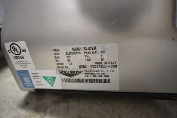 BRAND NEW SCRATCH AND DENT! Vollrath SLM300P/S Stainless Steel Commercial Countertop Meat Slicer w/ Blade Sharpener. 120 Volts, 1 Phase. Tested and Powers On But Parts Do Not Move - Image 8 of 8