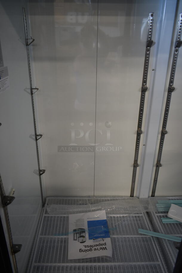 BRAND NEW SCRATCH AND DENT! 2023 Avantco 178GDS47HCB Metal Commercial 2 Door Reach In Cooler Merchandiser w/ Poly Coated Racks on Commercial Casters. See Pictures for Broken Glass on Right Door. 115 Volts, 1 Phase. Tested and Working! - Image 6 of 7