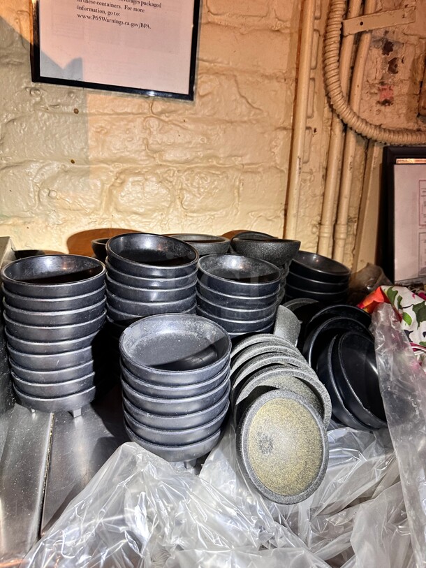 One Lot Of Black Round Salsa Containers  - Image 1 of 3