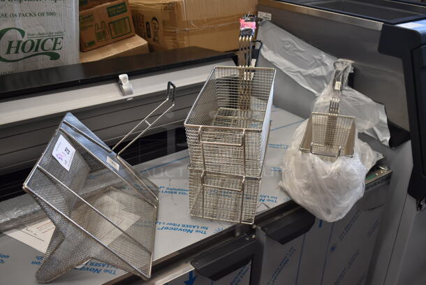 5 Various BRAND NEW SCRATCH AND DENT! Items Including Two 190FB1375 13 1/4" x 5 5/8" x 5 5/8" Fryer Basket with Front Hook, Two 3511005190 Cooking Performance Group 3511005190 13 1/2" x 7" x 5 3/8" Fryer Basket with Front Hook for CF15 and CF30 Countertop Fryers, 190SDMHTTRAY 14" x 12 1/4" x 6 1/2" Fryer Sediment Tray. 5 Times Your Bid!  - Image 2 of 7