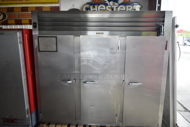 Traulsen RLT332WREFHS Stainless Steel Commercial 3 Door Reach In Cooler. 115 Volts, 1 Phase. Tested and Powers On But Does Not Get Cold. Appears to Have Piercing Valve - Image 1 of 4