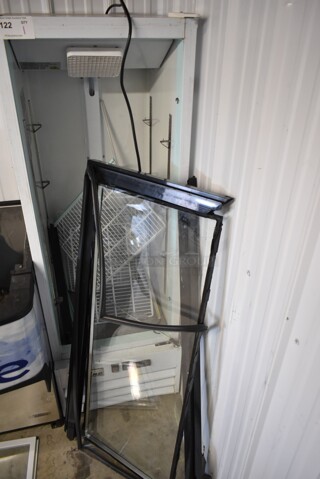 Coldline G10-W Metal Commercial Single Door Reach In Cooler Merchandiser. Door Is Not Attached. 115 Volts, 1 Phase. Tested and Powers On But Does Not Get Cold