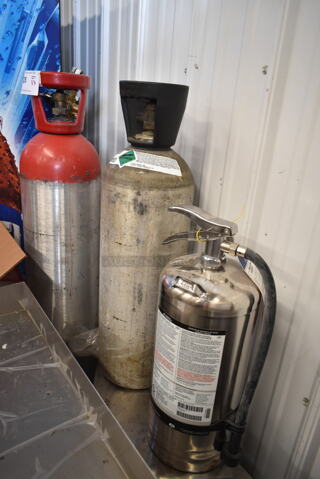 3 Items; 2 Metal Carbon Dioxide Tanks and 1 Wet Chemical Fire Extinguisher. 3 Times Your Bid! Buyer Must Pick Up - We Will Not Ship This Item. 