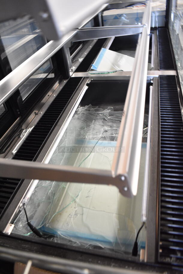 BRAND NEW SCRATCH AND DENT! Avantco 193BCD72B Metal Commercial Floor Style 72" Curved Glass Black Dry Bakery Display Case on Commercial Casters. See Pictures for Broken Glass. 110-120 Volts, 1 Phase.  - Image 3 of 7