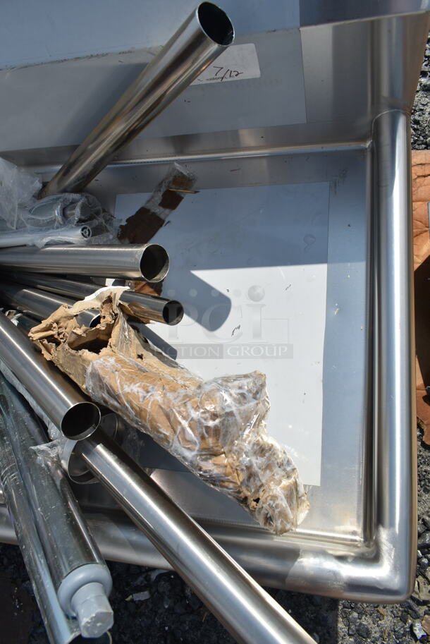 BRAND NEW SCRATCH AND DENT! Regency 600S2171718R 57" 16 Gauge Stainless Steel Two Compartment Commercial Sink with Galvanized Steel Legs and 1 Drainboard - 17" x 17" x 12" Bowls - Image 4 of 9