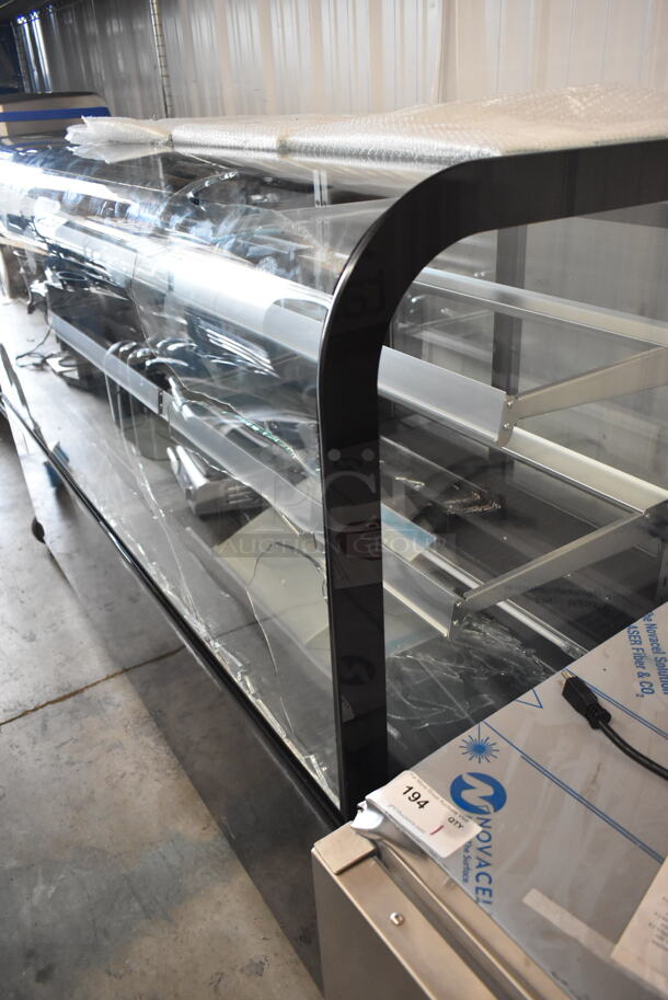 BRAND NEW SCRATCH AND DENT! Avantco 193BCD72B Metal Commercial Floor Style 72" Curved Glass Black Dry Bakery Display Case on Commercial Casters. See Pictures for Broken Glass. 110-120 Volts, 1 Phase.  - Image 7 of 7
