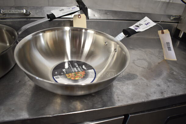 2 BRAND NEW SCRATCH AND DENT! Vollrath Tribute 11" Heavy-Duty Tri-Ply Stainless Steel Stir Fry Pan with Black Silicone Handle 702111 and Vollrath Tribute 6 Qt. Tri-Ply Stainless Steel Saute Pan with Black Silicone Handle 702160. 2 Times Your Bid!  - Image 3 of 9