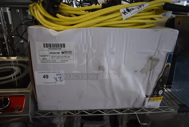 2 BRAND NEW SCRATCH AND DENT! Voltec 08-00198 U-Ground Work Light String with 10 Metal Cages - 100' 12/3 Cord, 150W Bulb Rating. 2 Times Your Bid!  - Image 4 of 6