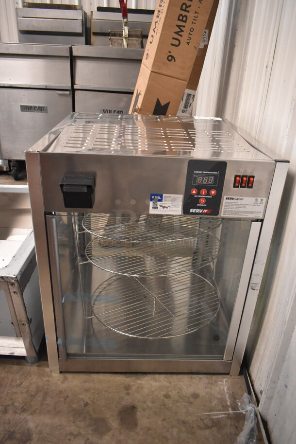 BRAND NEW SCRATCH AND DENT! ServIt 423ODW18D2 Stainless Steel Commercial Countertop 18" Self-Service Pizza Warmer with 4-Shelf Rotating Rack. 120 Volts, 1 Phase. Tested and Working! - Image 2 of 7