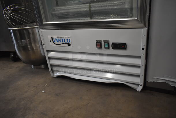BRAND NEW SCRATCH AND DENT! 2023 Avantco 178GDC12FHCW Metal Commercial 27" White Customizable Swing Glass Door Merchandiser Freezer with LED Lighting and Poly Coated Racks. 115 Volts, 1 Phase. Tested and Working! - Image 4 of 7