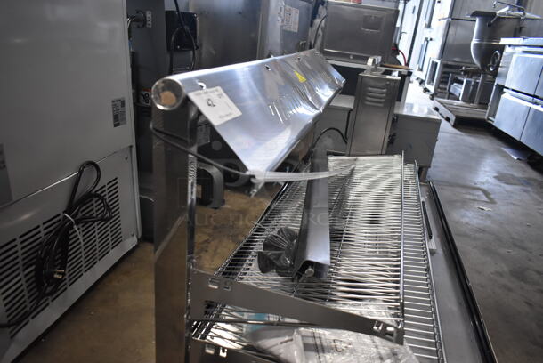 BRAND NEW SCRATCH AND DENT! ServIt 423HDM48SA Stainless Steel Commercial Countertop 48" Self / Full Service 3 Shelf Countertop Heated Display Case with Sliding Doors. See Pictures for Damage. 120 Volts, 1 Phase. Tested and Powers On But Does Not Get Warm - Image 5 of 6