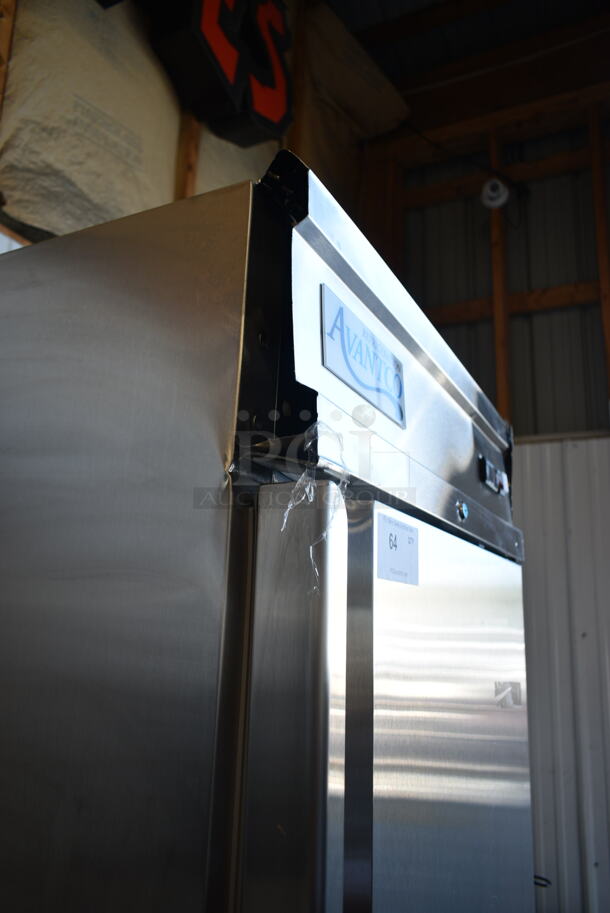 BRAND NEW SCRATCH AND DENT! 2023 Avantco 178SS1F2HC Stainless Steel Commercial 2 Half Size Door Reach In Freezer w/ Poly Coated Racks on Commercial Casters. 115 Volts, 1 Phase. Tested and Working! - Image 5 of 10