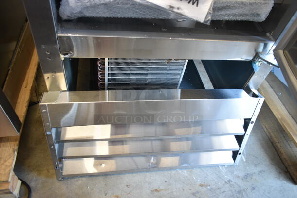 BRAND NEW SCRATCH AND DENT! 2023 Avantco 178SS1F2HC Stainless Steel Commercial 2 Half Size Door Reach In Freezer w/ Poly Coated Racks on Commercial Casters. 115 Volts, 1 Phase. Tested and Working! - Image 8 of 10