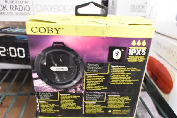 4 BRAND NEW IN BOX! Items Including Waterproof True Wireless Speaker, Wall Mount For Echo Dot, Coby Bluetooth Speaker. 4 Times Your Bid!  - Image 2 of 7