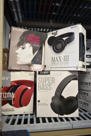 4 BRAND NEW IN BOX! Items Including Coby Max-III Wireless Folding Headphones, Coby Tunz Headphones, Coby Super Bass Headphones and Coby Karizma Headphones. 4 Times Your Bid!