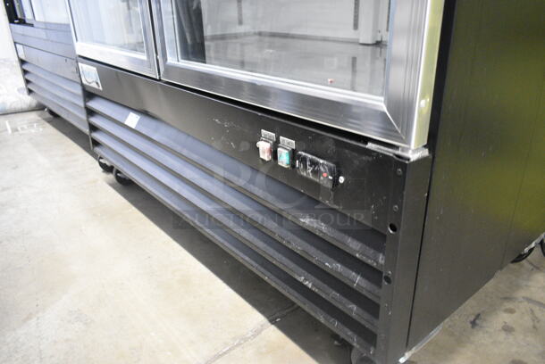 BRAND NEW SCRATCH AND DENT! Avantco 178GDC49HCB 53" Black Customizable Swing Glass Door Merchandiser Refrigerator with LED Lighting and Poly Coated Racks on Commercial Casters. 115 Volts, 1 Phase. Tested and Working! - Image 4 of 7