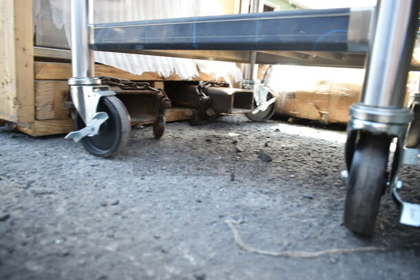 BRAND NEW! Stainless Steel Table w/ 2 Under Shelves on Commercial Casters.  - Image 3 of 3