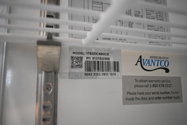 BRAND NEW SCRATCH AND DENT! Avantco 178GDC49HCB 53" Black Customizable Swing Glass Door Merchandiser Refrigerator with LED Lighting and Poly Coated Racks on Commercial Casters. 115 Volts, 1 Phase. Tested and Working! - Image 7 of 7