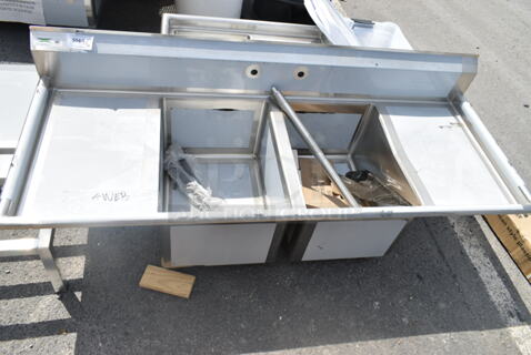 BRAND NEW SCRATCH AND DENT! Regency 600S21824218 Stainless Steel Commercial 2 Bay Sink w/ Dual Drain Boards. No Legs. Bays 18x24. Drain Boards 16.5x26