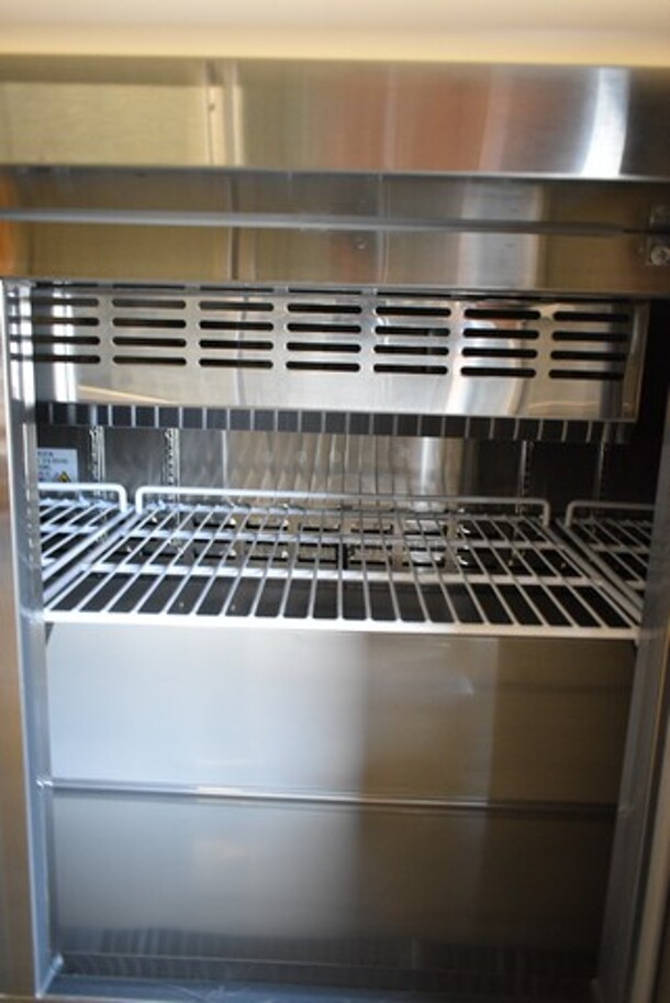 BRAND NEW SCRATCH AND DENT! 2023 Avantco 178SSPTM7118 Stainless Steel Commercial Sandwich Salad Prep Table Bain Marie Mega Top on Commercial Casters. 115 Volts, 1 Phase. Tested and Powers On But Does Not Get Cold - Image 6 of 8