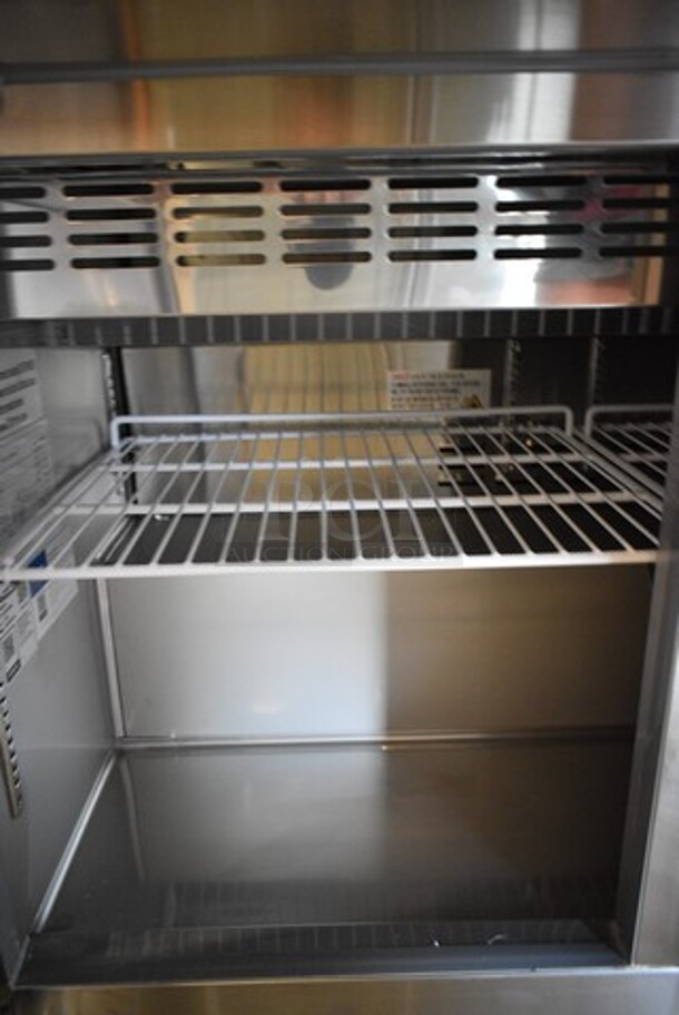BRAND NEW SCRATCH AND DENT! 2023 Avantco 178SSPTM7118 Stainless Steel Commercial Sandwich Salad Prep Table Bain Marie Mega Top on Commercial Casters. 115 Volts, 1 Phase. Tested and Powers On But Does Not Get Cold - Image 7 of 8