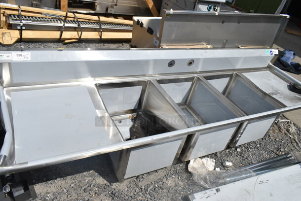 BRAND NEW SCRATCH AND DENT! Regency 600S31824224 Stainless Steel Commercial 3 Bay Sink w/ Dual Drain Boards. No Legs. Bays 18x23x14. Drain Boards 22.5x25.5. - Image 2 of 5