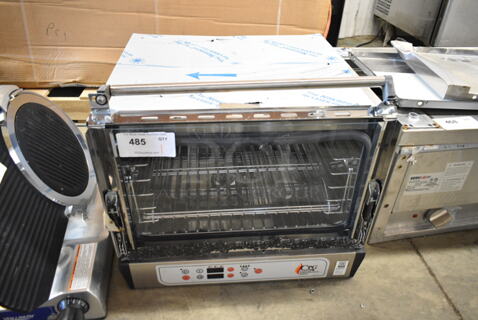BRAND NEW SCRATCH AND DENT! Cooking Performance Group CPG 351COHD3A Stainless Steel Countertop Half Size Electric Powered Convection Oven. See Pictures for Broken Glass on Door. 110 Volts, 1 Phase. Tested and Working!