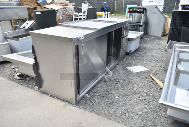 BRAND NEW SCRATCH AND DENT! Regency 600FBT2472R 24" x 72" 16 Gauge Type 304 Stainless Steel Enclosed Base Sliding Door Table with Drawers - Image 3 of 6