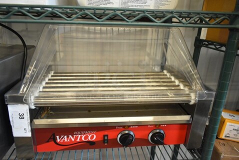 2021 Avantco 177RG1818 Stainless Steel Commercial Countertop Hot Dog Roller w/ Clear Poly Cover. 120 Volts, 1 Phase. Tested and Working!